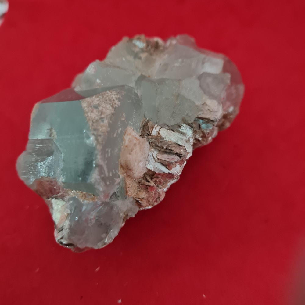 Rough aquamarine with muscovite